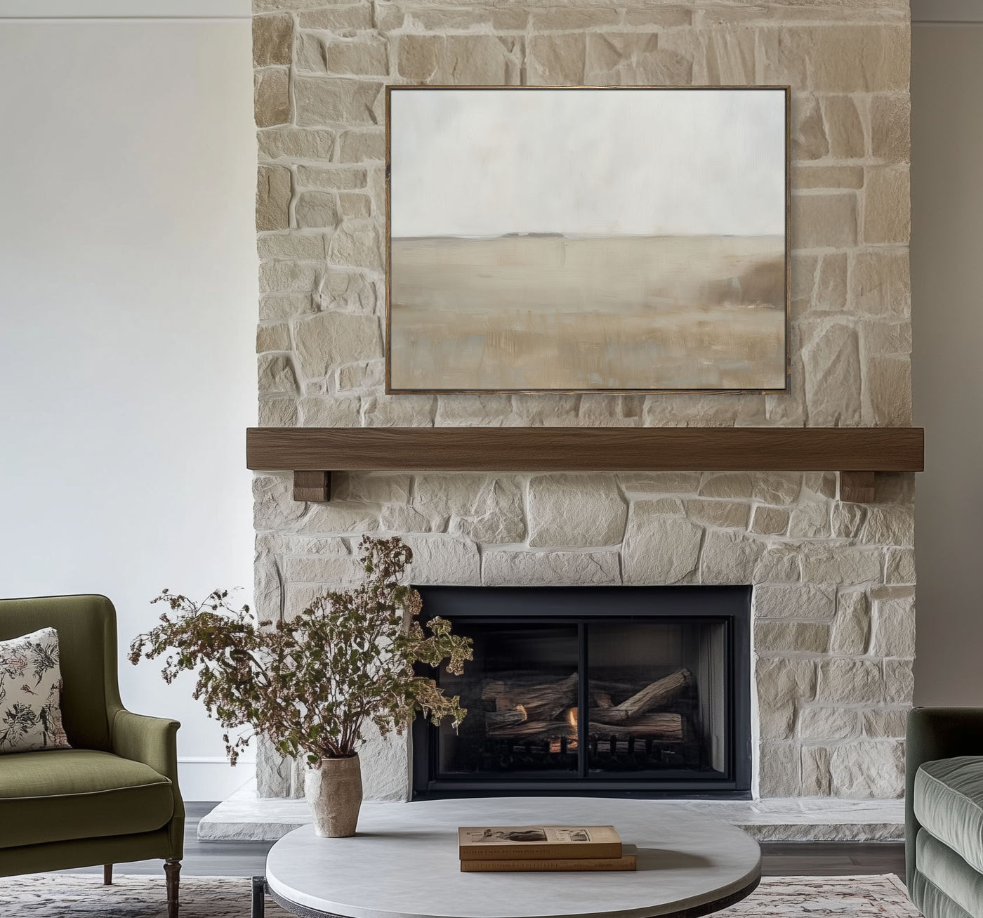 Living room with stone fireplace, green armchair, and abstract painting.